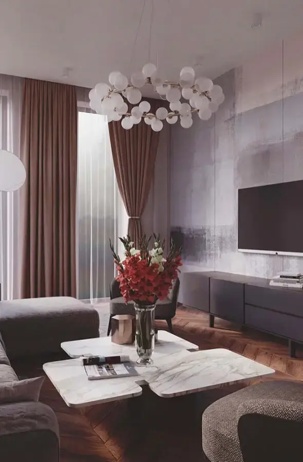 decoração moderna para sala com luminária de teto e mesa de mármore Foto Pinterest