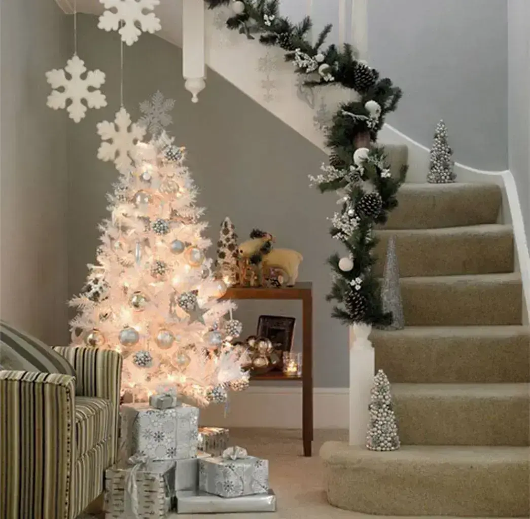 White Christmas tree with silver
