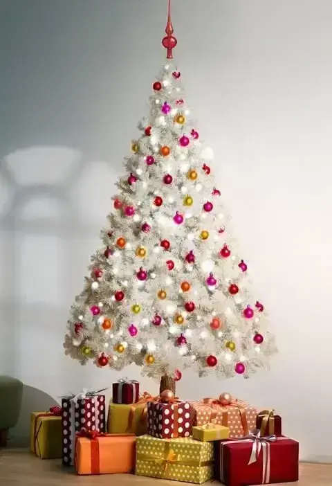 White Christmas tree with colorful little balls Photo by Asset Project