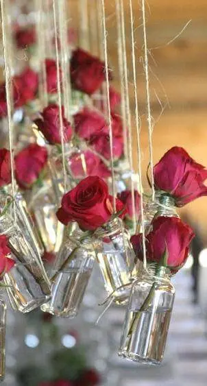 decoração de casamento garrafa rosas vermelhas
