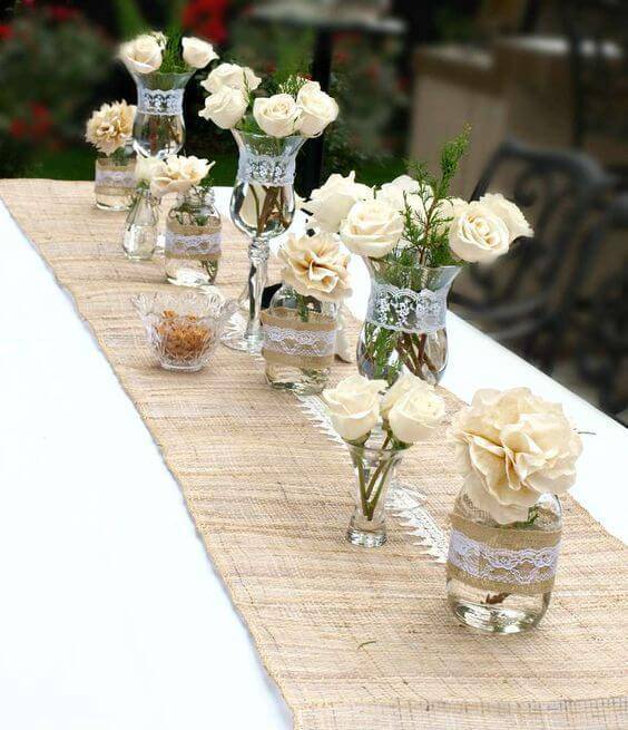 enfeites de mesa externa flores e vasos