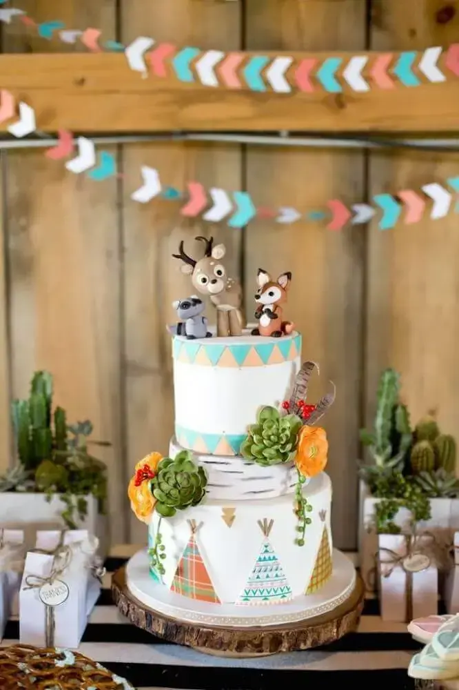 diaper tea cake decorated with little animals on top and juicy Photo Tinyme