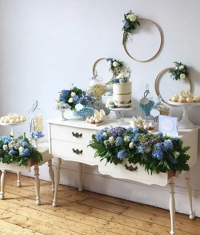 simple decoration for baby tea with white and blue flower arrangements Photo Buffets by Design
