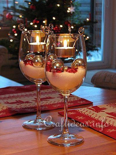 arranjos de natal para mesa com velas suspensas