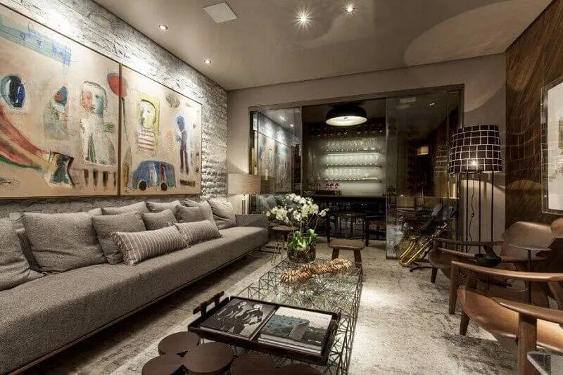 sala planejada com sofá cinza