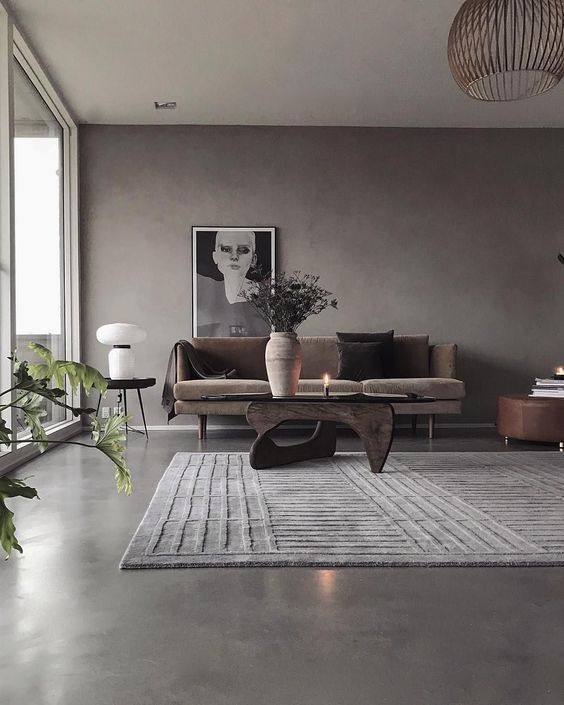 Sala de estar moderna com piso cimento queimado