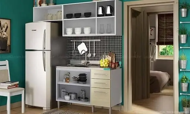 Cozinha modulada com armário branco e com gavetas bege Projeto de Lojas KD