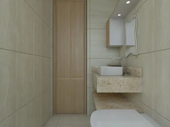 Banheiro com pia de mármore travertino Projeto de Bárbara Silva