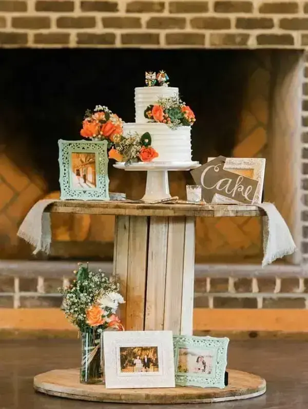 In simple wedding decoration use the wooden spool as a table