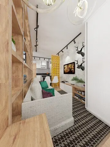 Sala de estar com meia parede de cobogó separando da cozinha Projeto de Jessica Campos