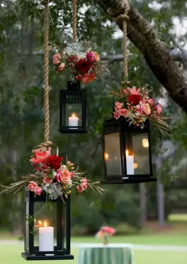 If the wedding is outdoors hang lamps on trees