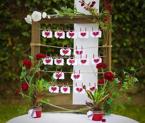 Love clothesline complements simple wedding decoration