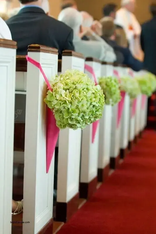 church decoration for wedding with bouquet of flowers