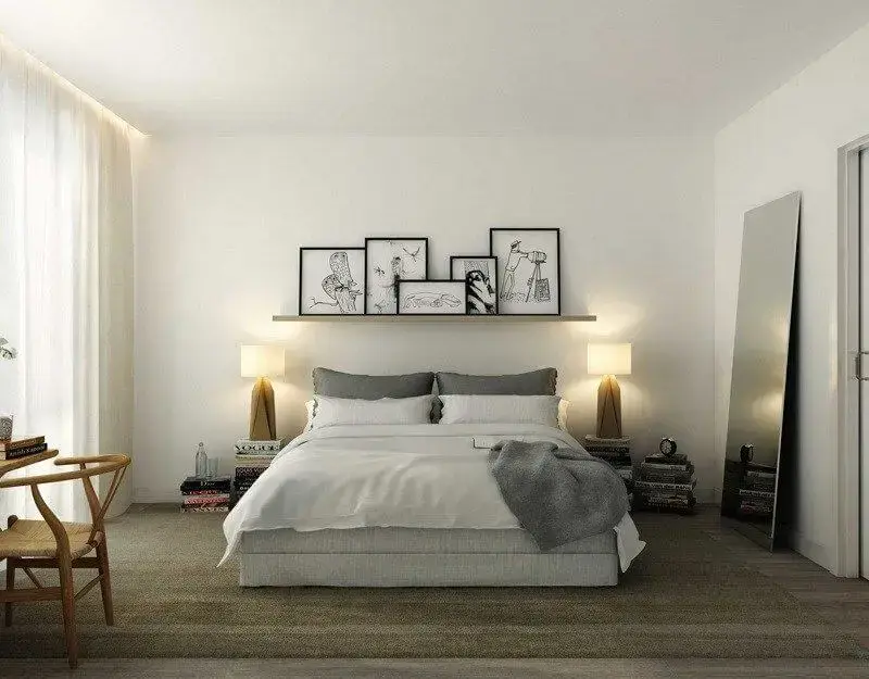 decoração minimalista no quarto com quadros