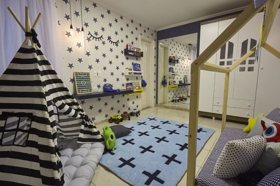 Cama montessoriana em quarto de menino Projeto de Andrea Bento