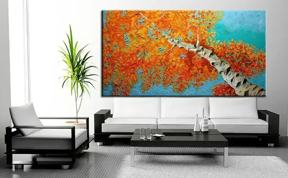decoração clean para sala de estar com quadro decorativo grande e colorido