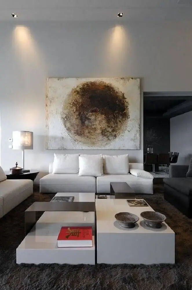 decoração moderna e sofisticada com quadro grande para sala de estar
