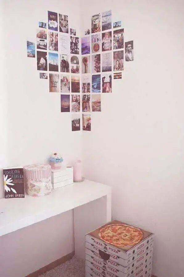 mural de fotos na parede em formato de coração