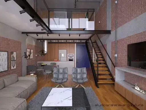 Loft com paredes de tijolos e encanamentos à mostra Projeto de Studio Scatena