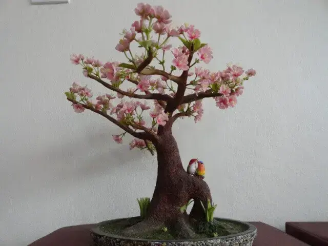 Bonsai com pássaros decorativos Foto de Watch Flower