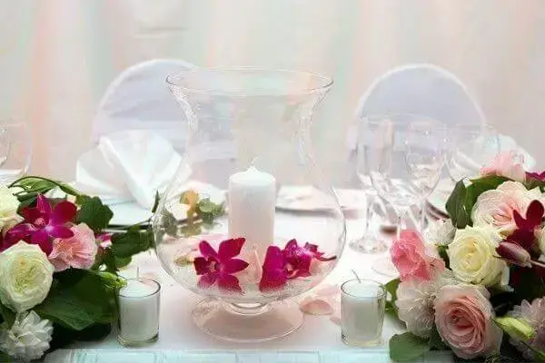 Engagement decoration table centrepiece with pot and candle