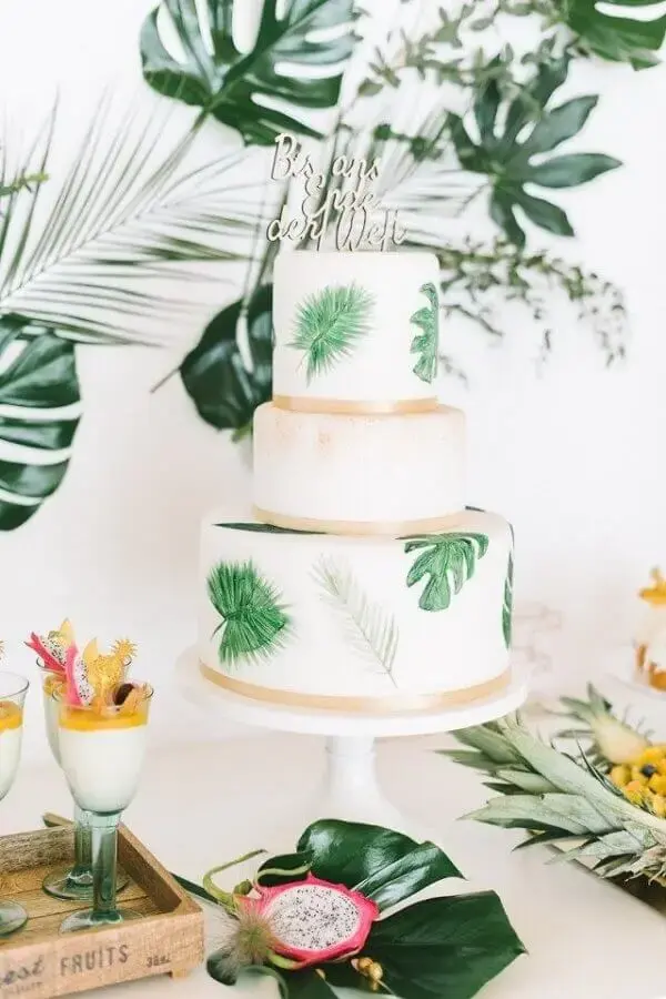 decoração festa tropical com folhagens para mesa de festa de casamento Foto Pinterest