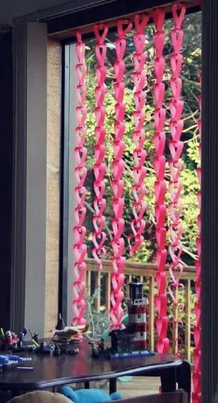 Cortina de coração cor de rosa na porta Foto de Atelier da Jaque