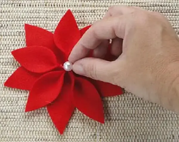 Christmas flower with pearl glued on