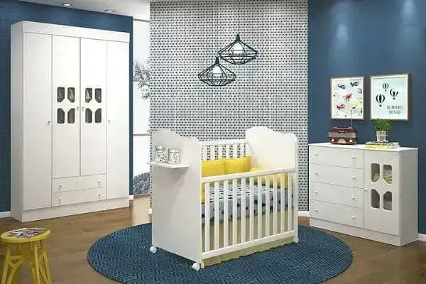 Quarto de bebê masculino com tapete redondo azul