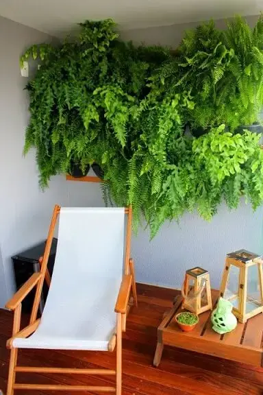 Terraço com jardim vertical em parte alta da parede Projeto de Zark Studio