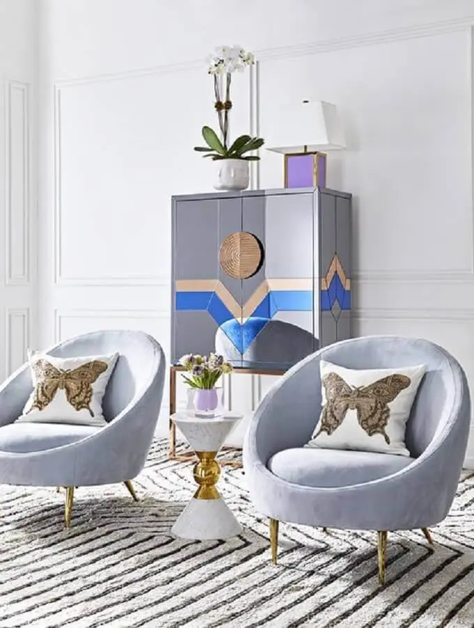 decoração com poltrona moderna azul e moldura de parede Foto Pinterest