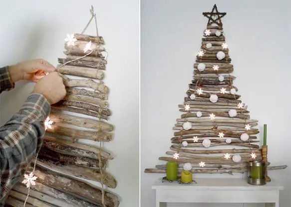 Árvore de natal artesanal feita com galhos e luzes em formato de flocos de neve Foto de Business and Cafe