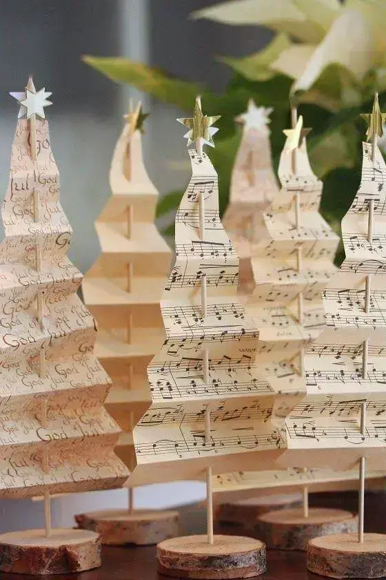 Christmas trees fixed on wooden toothpick decorate the table