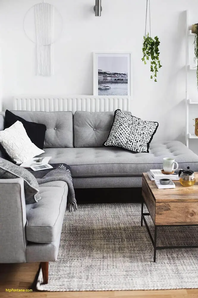 decoração minimalista com sofá em l para sala pequena Foto Fontana