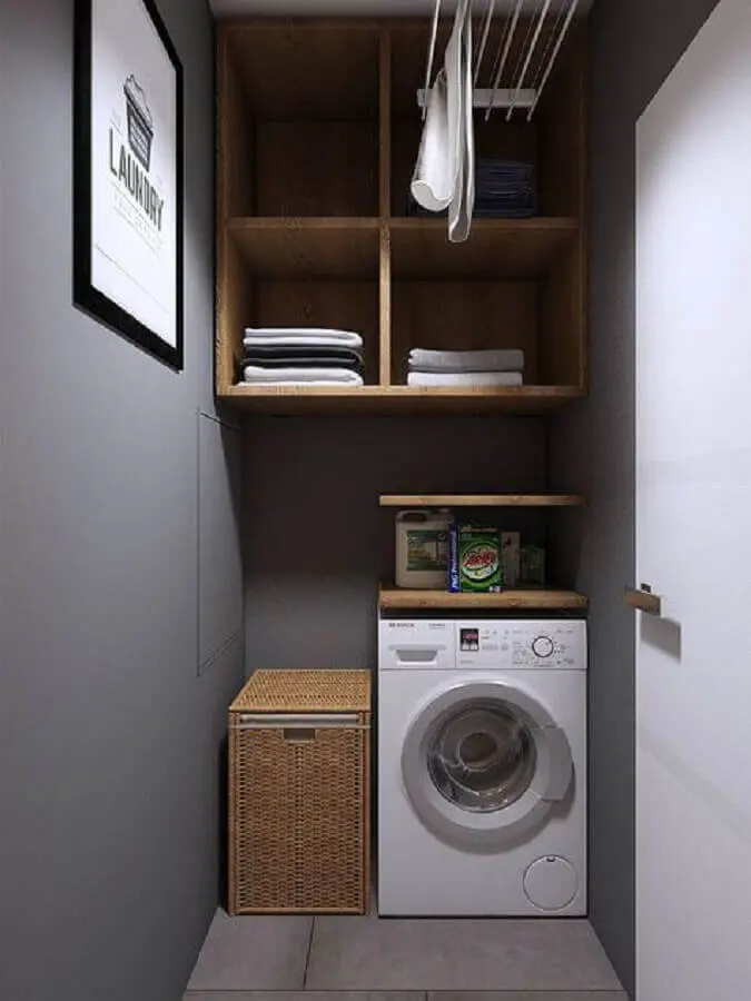 decoração moderna para lavanderia pequena planejada com nichos de madeira e parede cinza Foto Pinterest