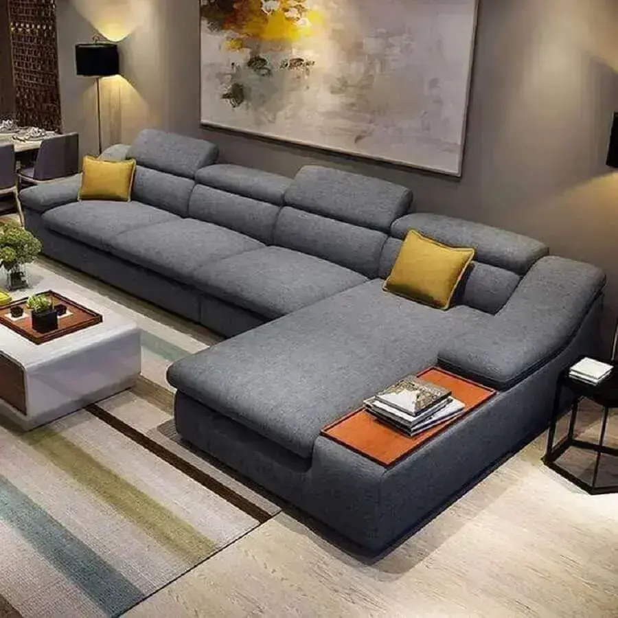 sofá de canto modernos para sala ampla decorada com tapete listrado Foto ElderBranch