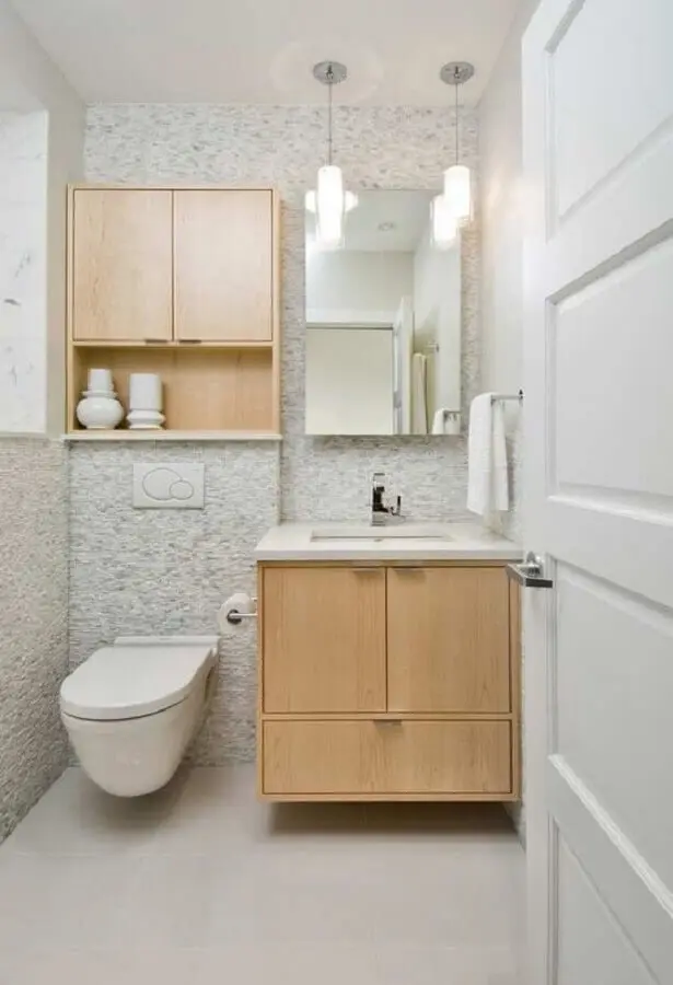 decoração com armário de madeira e cuba de embutir para lavabo Foto Mauricio Gebara Arquitetura