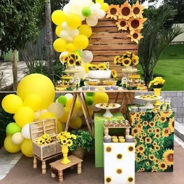 The sunflower theme birthday party adds a more rustic touch