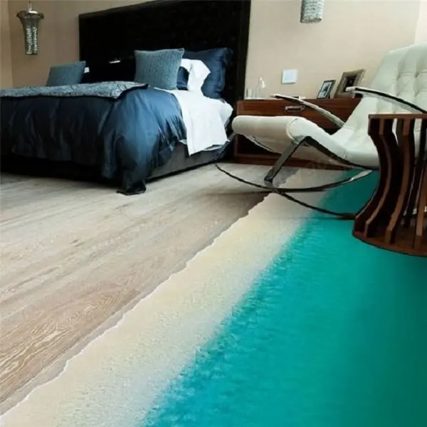 O piso 3D imprimi estilo praiano na decoração de quarto de casal