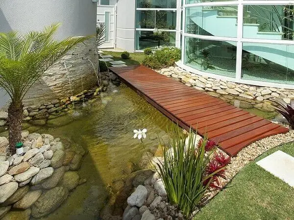 Aproveite a área externa da casa para incluir um Jardim Japonês