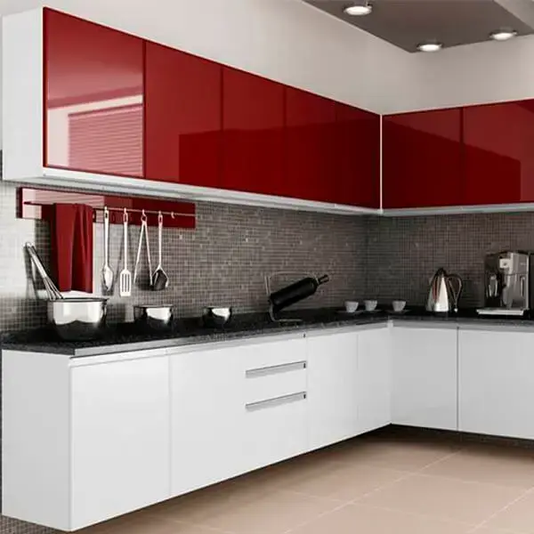 Cozinha em l com armários na cor vermelha