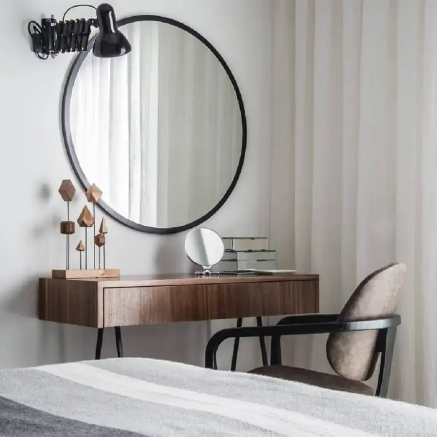 espelho redondo com moldura preta para decoração de quarto Foto CONECTARQ
