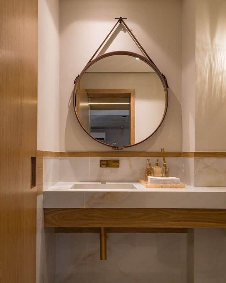 espelho redondo para banheiro decorado em tons neutros Foto Ferrassa & Pickler Arquitetura