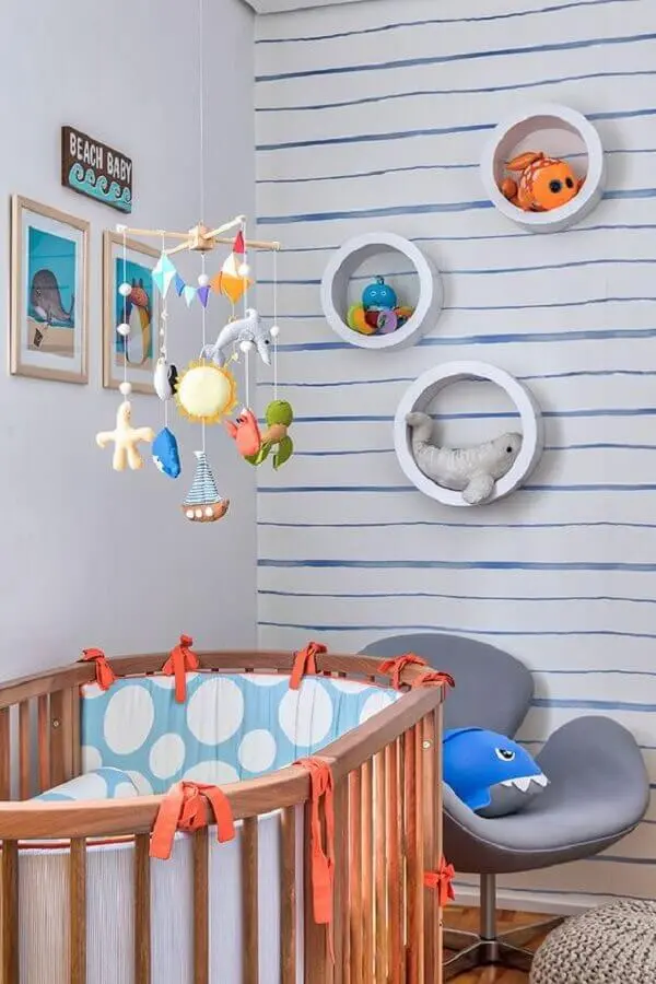 nicho redondo para quarto de bebê decorado com tema fundo do mar Foto Doob Arquitetura