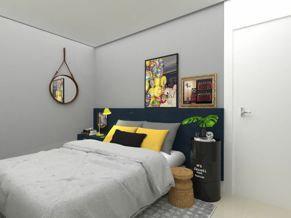 quarto de casal moderno - cama com almofadas amarelas ao lado de tonel como criado mudo