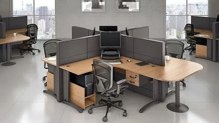 Em ambientes com mesa em formato l opte por uma cadeira para escritório giratória e com rodízios