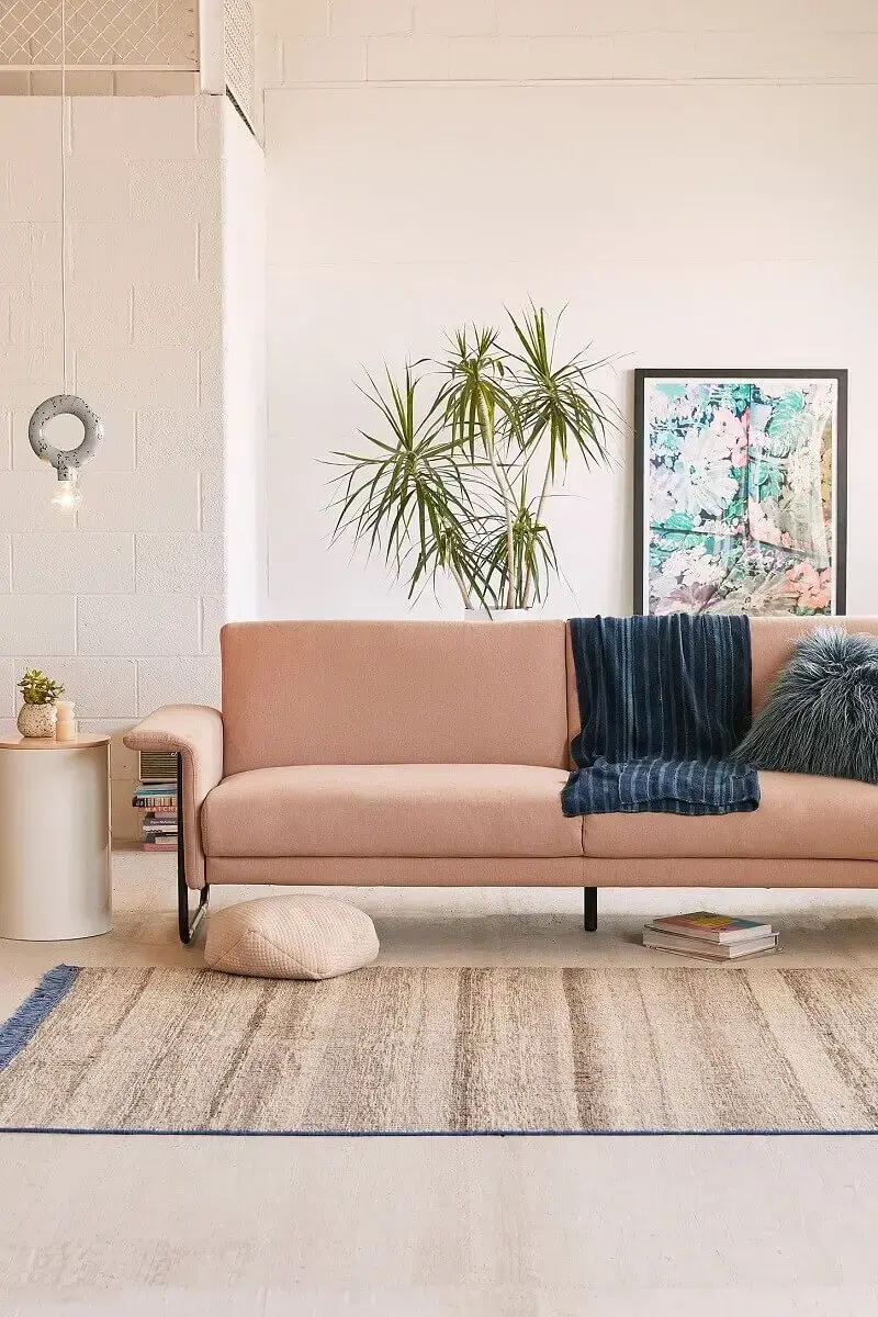 decoração clean com sofá moderno rosa