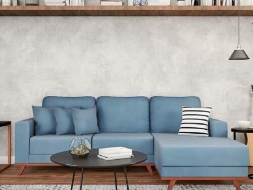 sala moderna decorada com sofá azul com chaise Foto Pinterest