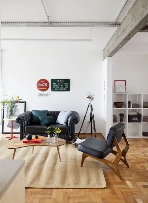 sofá chesterfield - sala de estar moderna com sofá chesterfield preto
