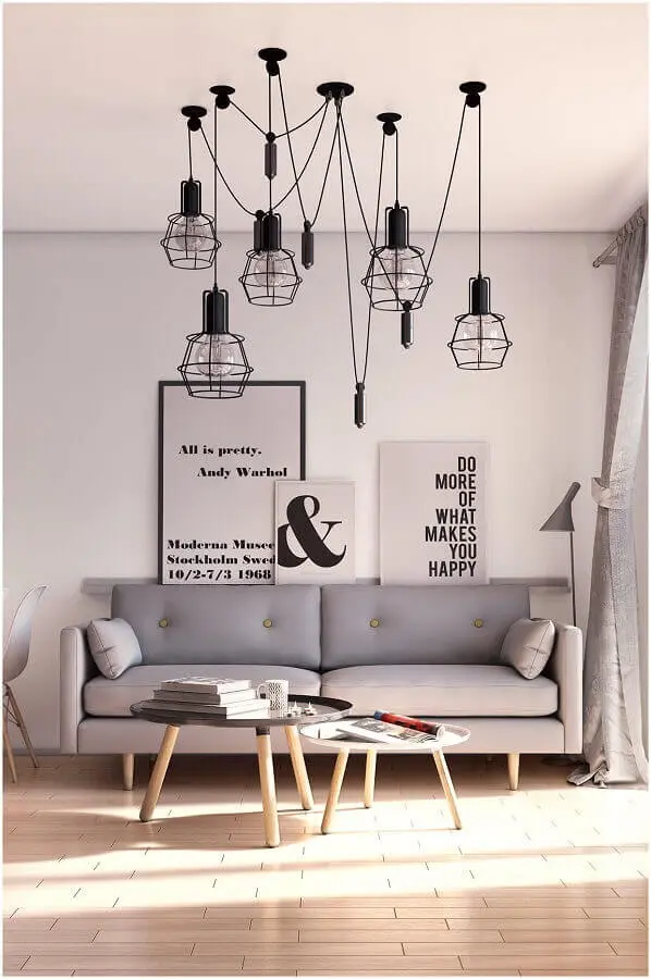 decoração minimalista com quadros decorativos para sala com pendentes aramados Foto Chateau de Conques